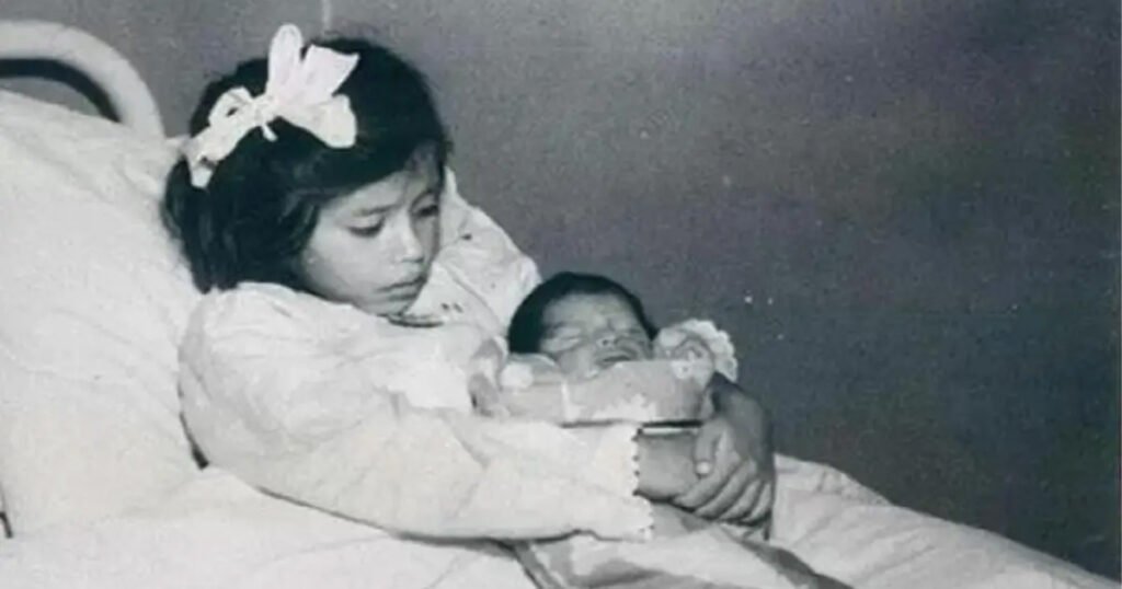 Lina Medina with her son